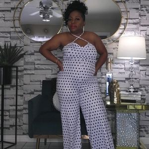 White jumper with black polka dots